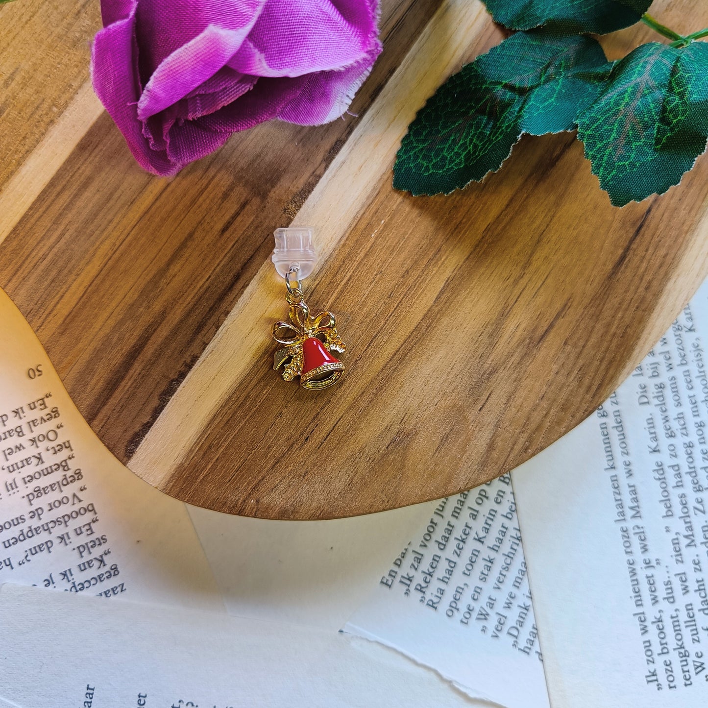 Jingle bell dust plug