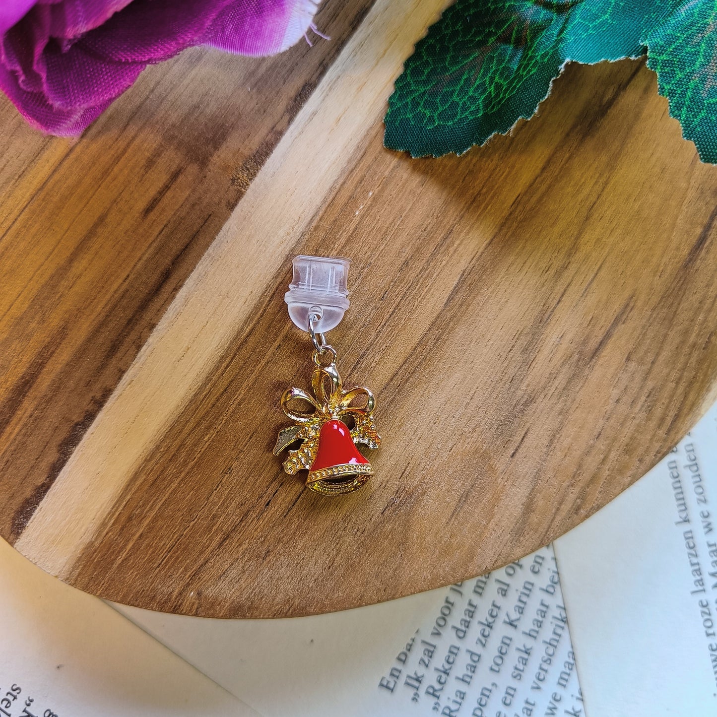 Jingle bell dust plug