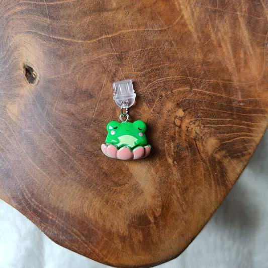 Lotus frog dust plug